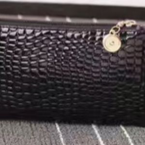 New Black crocodile clutch